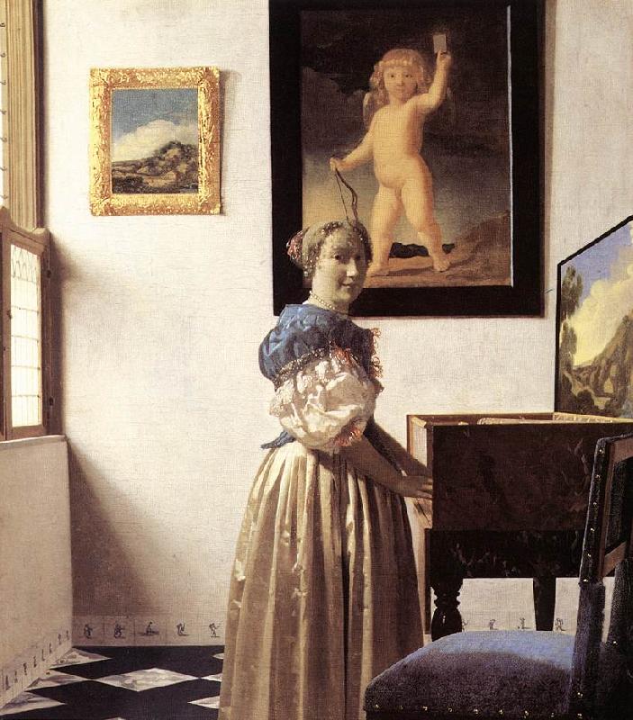 VERMEER VAN DELFT, Jan Lady Standing at a Virginal er